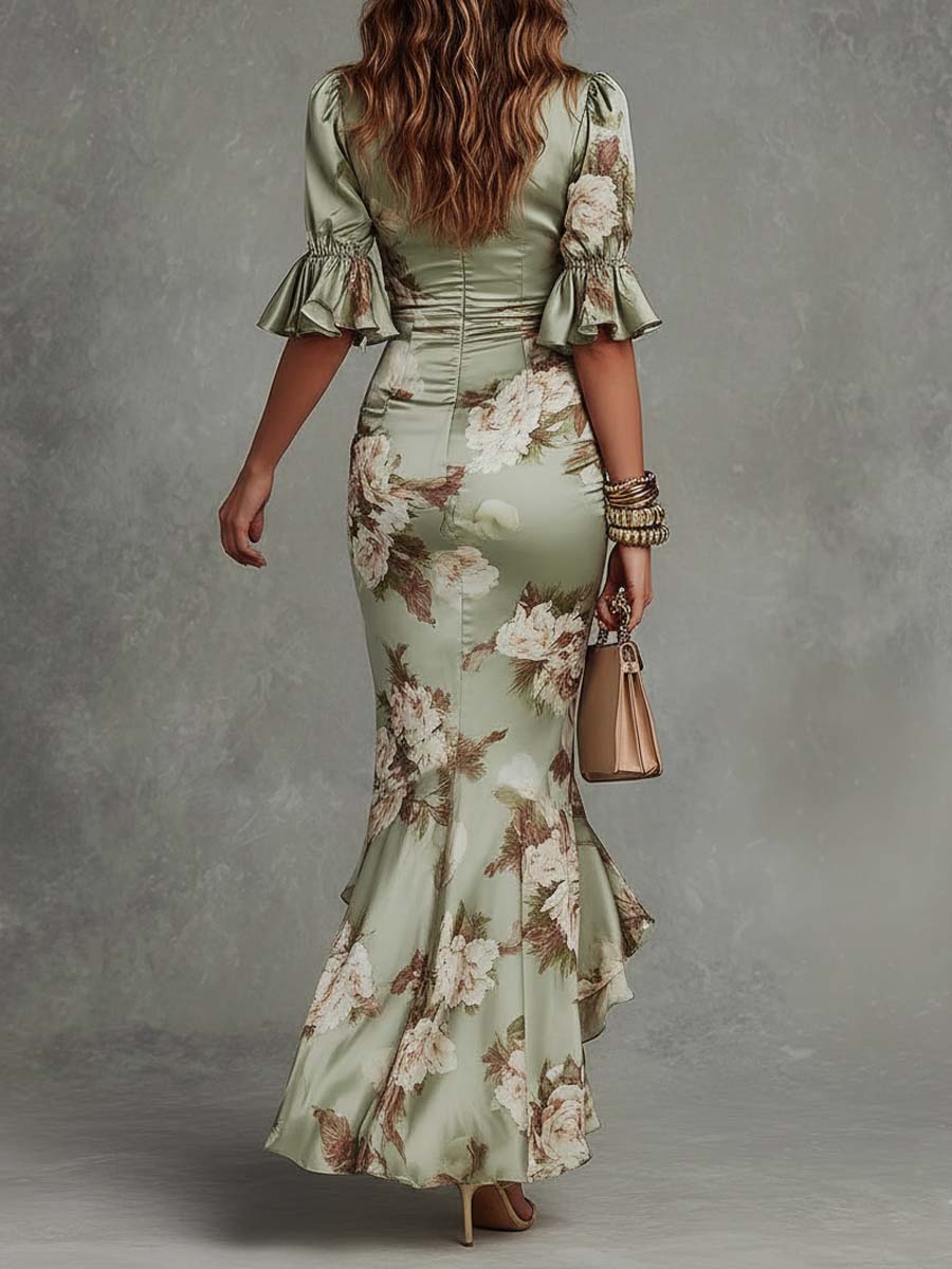 Anne | Robe longue asymétrique verte à col en V, manches bouffantes et imprimé floral